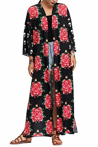 Woman wearing long black floral kimono.