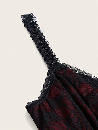 Close-up of a black lace strap on a garment