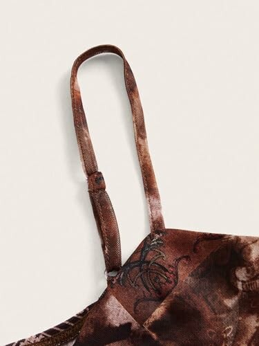 Close-up of a brown patterned dress strap