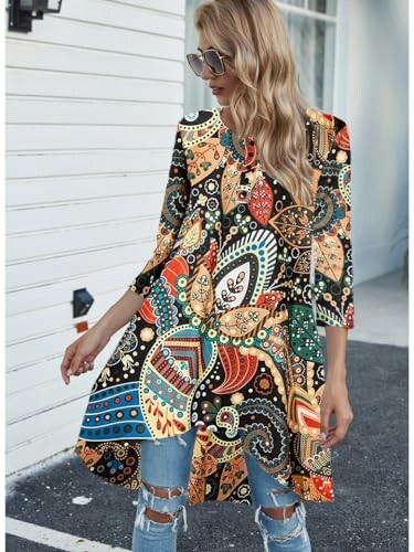 Woman in colorful bohemian dress with sunglasses.