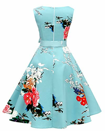 Vintage blue dress with floral pattern.