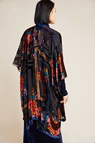 Person wearing a floral kimono-style cardigan.