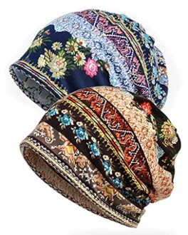 Two floral patterned beanie hats in blue and brown tones.