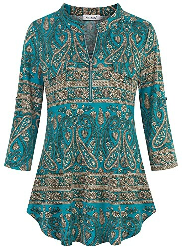 Turquoise patterned tunic top with three-quarter sleeves.