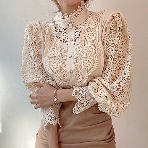 Woman wearing vintage lace blouse with intricate patterns.