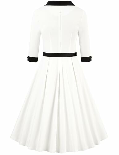 White vintage-style dress with black accents