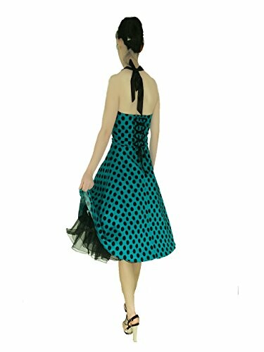 Woman in blue polka dot dress, back view