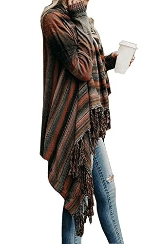 Woman in striped fringe cardigan holding coffee